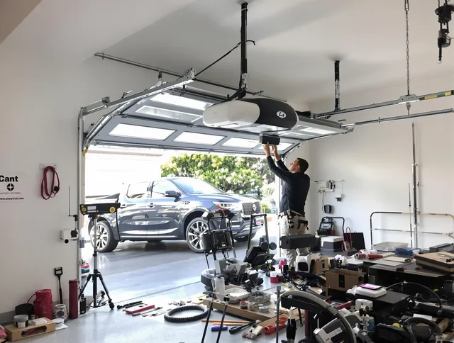 Monterey Park Garage Door Repair specialist installing smart garage door opener system in Monterey Park home