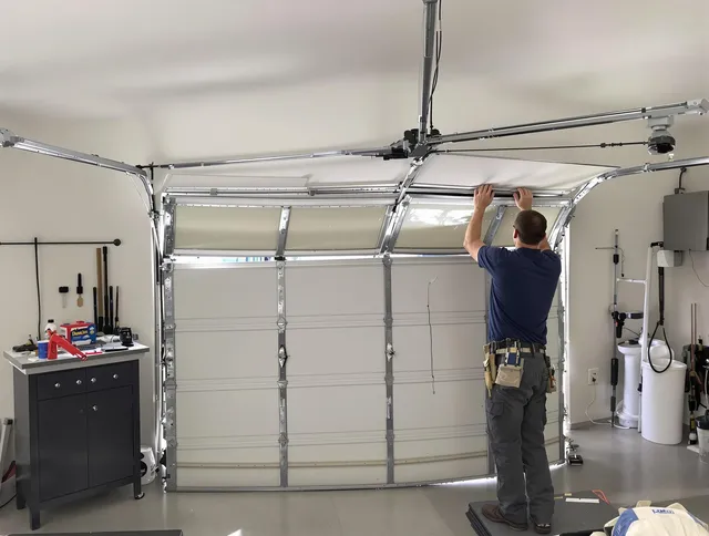 Monterey Park Garage Door Repair specialist performing precise section replacement on Monterey Park garage door